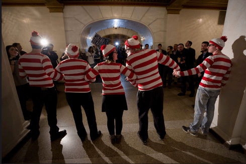 Five MarchOnHarrisburg activists dress as ‘Where’s Waldo?’ characters, holding signs that read, "Where’s Turzai?” and “Where’s Dermody?”